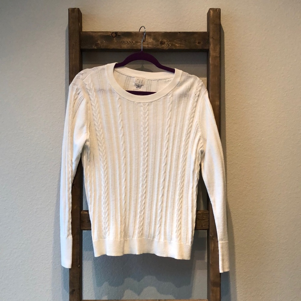 Women’s white cable knit sweater